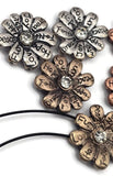 Add intention to your creations with inspirational word flower slider beads. Finished in silver, copper, and antique gold, each flower showcases etched affirmations and a rhinestone center. The dual-hole layout prevents twisting, ensuring a professional finish. Use as statement focals in leather wrap bracelets, pendant necklaces, or festival chokers. Ideal for wellness gifts and everyday motivation jewelry.