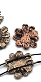 Brighten your designs with affirmation flower 2 hole beads in silver, copper, and antique gold. Uplifting words—Hope, Joy, Love, Faith—encircle a sparkling crystal center. Their two-hole slider engineering ensures a secure, flat fit in multi-strand projects, perfect for bracelets, pendants, and festival chokers. A meaningful focal for bohemian, spiritual, and wellness-themed jewelry collections. Lightweight, durable alloy construction.