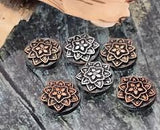 These round mandala sliders bring artisan texture to any project. A layered medallion motif pops in copper or silver over a rustic teal patina base. The two‑hole slider construction aligns multi‑strand bracelets and prevents twisting. Non‑tarnish metal for everyday wear. Use as focal beads or bold spacers in boho, festival, and Southwestern jewelry. Set of six.