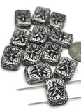 These antique silver starfish slider beads are perfect for nautical and bohemian jewelry. Each rectangular bead is decorated with a raised starfish, offering rustic seaside appeal. The dual-hole design holds cords in place for structure and durability, whether used in chokers, bracelets, or layered necklaces. Great for beach lovers, coastal gift jewelry, and artisan accessories inspired by the ocean.
