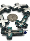 These artisan cross 2-hole slider beads bring a powerful blend of rustic charm and spiritual meaning. Featuring a raised silver-tone cross encased in a patina frame, they’re designed with dual-hole construction that ensures balance and durability. Perfect for making symbolic bracelets, chokers, or necklaces, they’re an excellent supply for Christian jewelry, boho accessories, or Western artisan creations honoring faith and devotion.