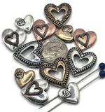 Add symbolic beauty to your jewelry creations with these antique-style heart 2-hole beads. Designed in silver, bronze, and copper finishes, each bead showcases open, solid, or double-layered heart shapes with rustic textures. The slider design provides balance and professional-quality structure in bracelets, necklaces, and chokers. Excellent for Valentine’s designs, wedding accessories, and artisan boho jewelry that expresses love and connection.