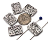 Silver metal 2 hole slider beads with etched tree branch design. Rectangular artisan beads that sit flat as focal beads in bracelets and chokers. Small, parallel holes fit fine beading wire, FireLine, Power Pro, or micro cord up to ~0.8 mm; not for leather. Lightweight, tarnish‑resistant finish. Set of 5 nature beads for woodland, cottagecore, and minimalist jewelry making.