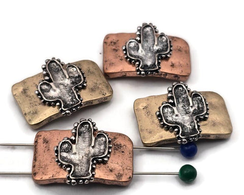 Bring Southwestern charm to your designs with cactus two‑hole slider beads. Each metal component includes two holes on each side for double‑strand bracelets, necklaces, earrings, and rings. Use both sets for stable spacing or just one side when your layout calls for flexibility. These uncommon findings also elevate zipper pulls, candle décor, and home accents—unique, hard‑to‑find components curated by our specialty bead shop.