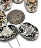 These flamingo slider beads bring a fun, coastal vibe to your jewelry projects. Designed in antique silver with bronze and copper accents, they feature a raised flamingo motif on an oval bead. The 2-hole slider style ensures stable, polished designs for bracelets, chokers, or necklaces. Perfect for boho jewelry, tropical collections, or thoughtful handmade gifts for bird lovers and beach enthusiasts.