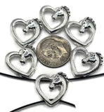 These horse slider beads are perfect for equestrian jewelry lovers. Each bead features a beautifully detailed horse head within a heart-shaped frame, finished in rustic antique silver. With dual-hole slider construction, they sit flat and secure in bracelets, chokers, and necklaces. Great for boho artisan jewelry, Western-inspired accessories, or handmade gifts celebrating horses, love, and country living.