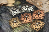 Add old-world charm with these sunburst medallion sliders. Each bead features crisp engraving, a faceted crystal accent, and a softly curved square shape for dimensional interest. Mixed metallic options—antique silver, copper, and brass—deliver instant boutique style. Reliable metal findings and unique beads that shine as focal beads or coordinated sets. Two-hole construction keeps designs neat and centered. Finish variations add artisan character.