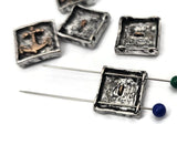 Elevate coastal projects with these maritime 2 hole sliders. Detailed anchors, wheels, and sailboats sit in sculpted frames that feel hand‑cast. Antiqued silver backgrounds and bronze motifs highlight every ridge and curve. Excellent focal beads for bracelets or simple pendants. Unique beads that deliver heritage‑meets‑harbor style and photograph beautifully on both white and lifestyle backgrounds.