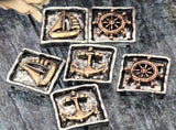 Nautical icon beads with character: a softly squared profile, hammered textures, and bronze reliefs against antique silver. The depth and contrast make easy focal beads that stand out in listings. Ideal for bracelet designs and pendant features on necklaces. Unique beads and sturdy metal findings that fit seaside, sailor, and travel themes with a refined yet rugged look.
