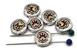 Pet paw print beads, 2 hole slider style, with heart-shaped pads. Round coin face in antique silver with warm copper or brass accents. Textured background adds depth and contrast. Great focal beads for bracelet designs and pendants on necklaces. Keywords: paw print bead, dog cat bead, animal lover bead, pet memorial bead, metal slider bead, pet jewelry supplies.