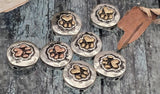Heart paw 2 hole slider beads for jewelry making. Mixed-metal round coin beads feature raised paw prints with heart centers. Antiqued silver base highlights copper and gold tones. Ideal focal beads for bracelets or simple necklace pendants. SEO terms: paw charm bead, dog mom bead, cat mom bead, animal paw bead, pet remembrance bead, metal focal bead.
