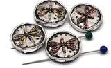 Rustic coin dragonfly slider beads with hammered texture and scalloped rim. The raised dragonfly pops in copper or brass against antiqued silver. Excellent focal beads for bracelet stacks and pendant accents. Keywords: dragonfly bracelet bead, boho nature bead, garden insect bead, metal focal bead, 2 hole slider bead.