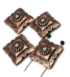 Boho western 2 hole slider beads—square copper conchos with detailed stamping and a center rosette cabochon. Rich antiquing highlights the pattern and scalloped edges. Great as focal beads for bracelets or necklace pendants. Search terms: copper concho charm, southwestern concho bead, engraved concho focal, ranch jewelry supplies.