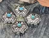 Western floral concho 2 hole beads with bright turquoise cab. The antiqued silver finish highlights every curve and scallop for an authentic saddle-tack look. Use as standout focal beads in bracelet designs and as pendant centers. Keywords: turquoise concho, silver concho bead, western focal bead, boho ranch jewelry supplies, 2 hole slider bead.