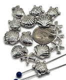 These ocean slider beads bring coastal magic to handmade jewelry. Featuring sea turtles, fish, seashells, and starfish in antique silver, their detailed raised designs add charm to necklaces, chokers, and bracelets. With 2-hole slider construction, strands remain flat, secure, and balanced. Perfect for boho designs, nautical jewelry, or unique handmade gifts inspired by the sea.