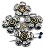 These large flower slider beads make a bold statement in handmade jewelry. Each antique silver bead features bronze-gold spiral centers and engraved petals with meaningful words such as Love, Faith, Hope, Joy, and Wish. With a secure 2-hole slider construction, they align cords perfectly, making them excellent for chokers, necklaces, or bracelets. Perfect for boho designers or spiritual artisan jewelry collections.