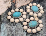 Turquoise oval cabochon concho sliders, round silver rosette settings with cream howlite‑style accents. True 2‑hole slide double‑strand design keeps strands flat and centered. Best for thin wire or thread. Use as focal beads in bracelet cuffs, chokers, or pendant necklaces. Jewelry making components/parts; supplier wholesale bead findings; cheap sliderbeads for quick kits.