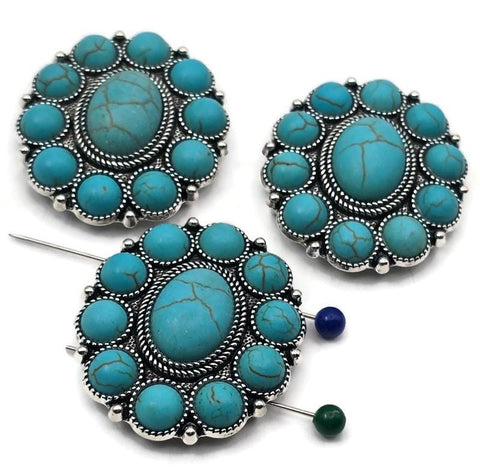 Large turquoise concho 2 hole slider beads with oval center cabochon and halo of round faux turquoise set in antique silver. True slide double‑strand design with small parallel holes for fine beading wire, FireLine, or micro cord (not leather/chain). Bold round focal beads for bracelets and chokers. Jewelry making supplies, components parts, unique spacer/filler DIY. Set of 3 statement sliders.