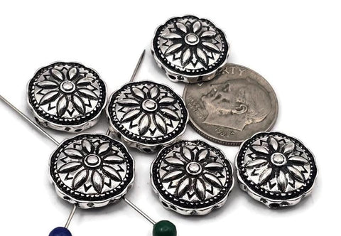 Antique silver round flower 2 hole slider beads with detailed petal mandala design. True slide double‑strand construction; small parallel holes keep thin strands aligned and flat—ideal for 0.015–0.018&quot; beading wire, FireLine, or micro cord. Not for leather/chain. Use as focal beads or unique spacer/filler components in bracelets and chokers. Jewelry making supplies, bulk wholesale metal findings. Set of 6 artisan sliderbeads.