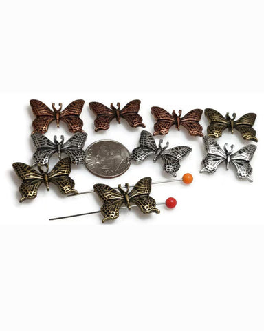 Celebrate growth and freedom through design with these two‑hole butterfly slider beads. Crafted in ornate detail, each bead features cutout wings in antique brass, copper, or silver finishes. Dual stringing holes ensure perfect placement for bracelets, chokers, or double‑strand necklaces. Ideal as symbolic focal beads, they suit artisan, vintage, bohemian, or nature‑inspired jewelry projects that require lasting beauty.