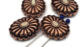 Copper flower concho 2‑hole slider beads—richly oxidized for depth. Cream oval cabochon pops against warm metal. Double‑strand slide design for flat, balanced bracelets and necklaces. Small‑hole beads for fine threads. Ideal jewelry making supplies, components parts, artisan focal, cheap sliderbeads, bulk wholesale metal.