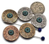 Round mandala 2‑hole slider beads with a raised turquoise‑patina bloom at center. Antique silver, copper, and brass tones show off the geometric rings. True double‑strand components: two small parallel holes keep thin strands aligned—perfect for 0.015–0.018&quot; beading wire, FireLine, or micro cord (not leather/chain). Ideal focal beads for boho bracelets, chokers, and pendant bars.