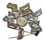 Add a global vibe with these carved arc sliders. The small, side‑by‑side holes make assembly fast and tidy on fine wire or thread. Perfect for making cuff‑style bracelets, pendant connectors, and horizontal focal bars. Lightweight components for craft fairs, Etsy shops, and DIY beading kits.