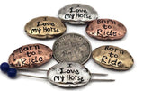 Equestrian word 2‑hole slider beads with “Born to Ride” and “I Love My Horse.” Mixed metals—antique silver, rustic copper, aged brass—give a vintage buckle vibe. Use as bracelet centerpiece, spacer bar, or pendant bar charm for western jewelry. Perfect for cowgirl gifts, barn besties, 4‑H fundraisers, and rodeo bracelets. Pair with turquoise howlite, jasper, or crystal.