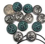 Round Celtic pattern 2‑hole beads make stunning focal sliders for double‑strand bracelets and chokers. With antique silver finish and touches of turquoise verdigris, they bring handcrafted style to Viking, renaissance, and boho jewelry designs. Excellent as structured spacers, strand separators, or pendants in artisan collections.