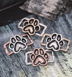 Add symbolic meaning to your jewelry with these paw print slider beads. Designed in antique copper, silver, and brass finishes, each bead highlights a raised paw framed by a rectangular base. With two hole construction, the beads stay flat and aligned in chokers and bracelets. Perfect for pet‑themed artisan jewelry, memorial keepsakes, or animal adoption gift accessories.
