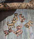 Add some puppy love to your creations with these detailed dog beads in antique brass and copper tones. Designed with whimsical details like heart and bone motifs, these beads are excellent for pet‑themed bracelets, charm necklaces, or memorial gifts. Their versatile size makes them easy to use in artisan jewelry projects, perfect for dog owners, animal lovers, or handmade gift items.
