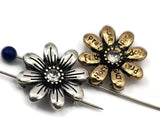 Brighten your handmade jewelry with these inspirational flower slider beads. Each daisy bead includes words such as Faith, Hope, Love, Pray, and Joy on the petals, highlighted by mixed silver, brass, and copper finishes. A rhinestone center adds sparkle, while two holes align them perfectly in bracelets and chokers. Great artisan focal beads for meaningful, bohemian, or spiritual designs.