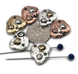 Add a coastal touch to your creations with these seashell 2‑hole slider beads. Each pebble‑shaped bead highlights a raised shell and starfish‑like details in antique copper, silver, and brass finishes. Dual holes ensure perfect alignment for bracelets and pendants. Lightweight yet full of detail, they’re artisan jewelry supplies for boho, nautical, or summer‑themed handmade gifts that celebrate the sea.