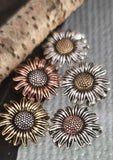 Celebrate nature with these sunflower beads, crafted with intricate detail in antique brass, copper, and silver finishes. Designed for artisan jewelry, each bead is non‑tarnish and built for durability. With two alignment holes, they work beautifully as pendants or necklace focals. Ideal for boho, rustic, or botanical jewelry projects, they provide timeless floral beauty in long‑lasting finishes.