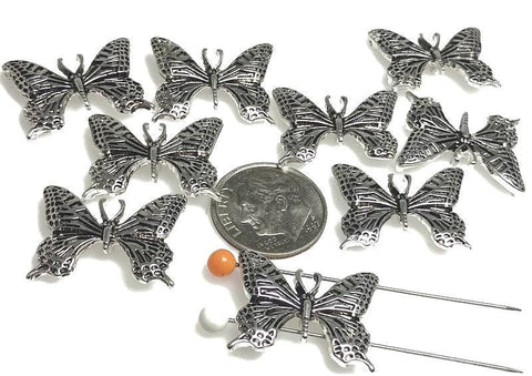 These butterfly 2‑hole slider beads make stunning focal components for artisan jewelry. Each bead features delicately detailed wings in an antique silver finish, designed to highlight natural beauty and transformation. With dual holes for secure alignment, they’re perfect for necklaces, chokers, or bracelet focal pieces. Ideal supplies for bohemian, nature‑inspired, or spring jewelry collections celebrating freedom and renewal.