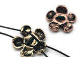 Meaningful flower 2‑hole slider beads with embossed affirmations around a spiral center. The antique finish with hints of verdigris highlights every petal beautifully. Ideal for bracelets and pendant bars, these beads represent positive energy, making them favorites for mindfulness, yoga, and bohemian jewelry projects celebrating peace and love.