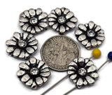 Antique silver daisy 2‑hole slider beads with crystal rhinestone centers highlight brilliant sparkle and dimensional texture. Each bead’s sculpted petals and dual holes make it easy to align in double‑strand bracelets or necklaces. Perfect as focal beads or structured spacers for spring, bridal, or elegant boho jewelry designs.