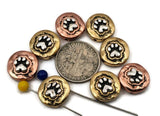 These durable mixed‑metal 2‑hole paw print sliders showcase antique brass and copper tones with silver accents. Designed for easy alignment in double‑strand bracelets or necklaces, they serve beautifully as focal points or spacers. Ideal for pet lovers, rescue supporters, and artisan jewelry makers seeking symbolic, nature‑inspired components.