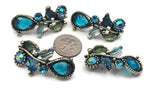 These teal rhinestone 2‑hole beads pair deep lagoon sparkle with leafy enamel accents. Antique brass frames and dotted edges add texture and depth. Dual holes hold the focal flat for bracelets, chokers, or multi‑strand designs. Great for fairytale, mermaid, and garden wedding jewelry requiring rich color and elegant details.