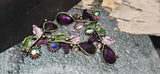 Add instant drama with purple resin and crystal 2‑hole slider focals. Beaded bezels, botanical branches, and enamel leaves create dimensional texture. Dual holes keep alignment secure in bracelets and chokers. Great for holiday, prom, or bridesmaid jewelry where luxe color and reliable construction are essential.