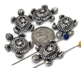 These detailed silver sea turtle beads feature crystal inlays and deeply carved shells, perfect for adding ocean flair to your designs. Use them as focal or accent beads in bracelets, chokers, or necklaces. With their polished brilliance and intricate texture, they bring marine beauty to coastal, spiritual, or nature‑inspired handmade jewelry.