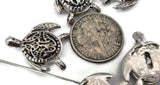 Bright silver turtle 2‑hole slider beads featuring ornate Celtic shell engravings. The double‑hole design assures structured alignment in bracelets and necklaces. Ideal for symbolic, oceanic, or spiritual jewelry celebrating endurance, movement, and interconnectedness. Beautiful craftsmanship meets deep meaning in these polished, detailed components.