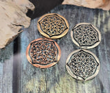 Create refined statement pieces with these filigree medallion 2‑hole sliders. The airy floral cutout pattern sits in a domed frame with antique silver, brass, or copper tones. Two holes provide secure alignment for cuff bracelets or necklace center bars. Ideal for vintage, Gothic, or romantic collections needing delicate metalwork and professional structure.