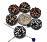 Create polished bohemian designs with this 6‑pack of mandala 2 hole beads. The dimensional floral medallions—copper and silver—sit on patina‑washed rounds for a handcrafted look. Dual holes ensure flat, stable placement on leather wrap bracelets and cord chokers. Mixed‑metal palette pairs easily with gemstones, crystals, and wood. Non‑tarnish finish for lasting shine.