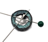 Bring artisan character to your shop with round mandala 2‑hole sliders. A detailed floral medallion in copper or silver crowns a teal patina base. Dual holes keep designs neat and professional, great for multi‑strand bracelets and layered necklaces. Mixed‑metal, non‑tarnish finish. Set of 6 beads ready for quick, cohesive listings.