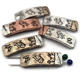Two‑hole butterfly sliders for double‑strand bracelets and necklaces. The curved rectangular shape stabilizes patterns; floral engraving adds a whimsical accent. Works with leather lace, rattail cord, beading wire, and seed beads. Ideal for cottagecore, woodland, and garden‑themed jewelry. Strong SEO keywords: bracelet spacer, slider bead, two hole connector, mixed metal bead, unique jewelry findings, artisan supplies.