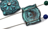 These boho medallion 2 hole slider beads are miniature artworks. A weathered turquoise patina highlights engraved details, and a clear crystal sparkles at the center. They’re unique beads that read vintage‑meets‑modern and serve perfectly as focal beads. Dependable metal findings with an artisan surface make simple layouts look gallery‑worthy. Excellent for capsule drops, layered stacks, and festival season.