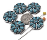 Concho‑style turquoise flower slider beads with two parallel holes. These metal beads function as focal beads and spacers in leather bracelets, hatbands, and layered necklaces. The western design pairs with heishi, howlite, and silver chain. Ideal findings for 2‑strand projects and DIY jewelry making. Add one for a centerpiece or string several for a bold runway look.