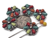 Southwestern flower 2-hole slider beads with multicolor turquoise-look petals. These concho-style metal beads make perfect focal beads for bracelets, hatbands, and chokers. Dual holes keep two strands aligned—ideal for leather cuffs, loom bands, and peyote strips. Use as spacer beads or statement findings in Western jewelry. Colors pop against antique silver, delivering instant rodeo and festival flair.