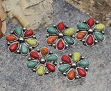 These multicolor 2-hole slider beads deliver a classic Western concho look. Use as focal beads for bracelets, pendants for necklaces, or hatband sliders. Two parallel holes prevent twisting on leather or bead-woven bands. Antique silver metal with red, teal, lime, and orange cabochons pairs with heishi, howlite, and silver chain. Great spacer beads and findings for Southwestern jewelry making.